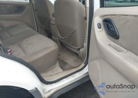 2003 Ford Escape Xlt z USA, uszkodzony, nr VIN 1FMYU03193KA72637